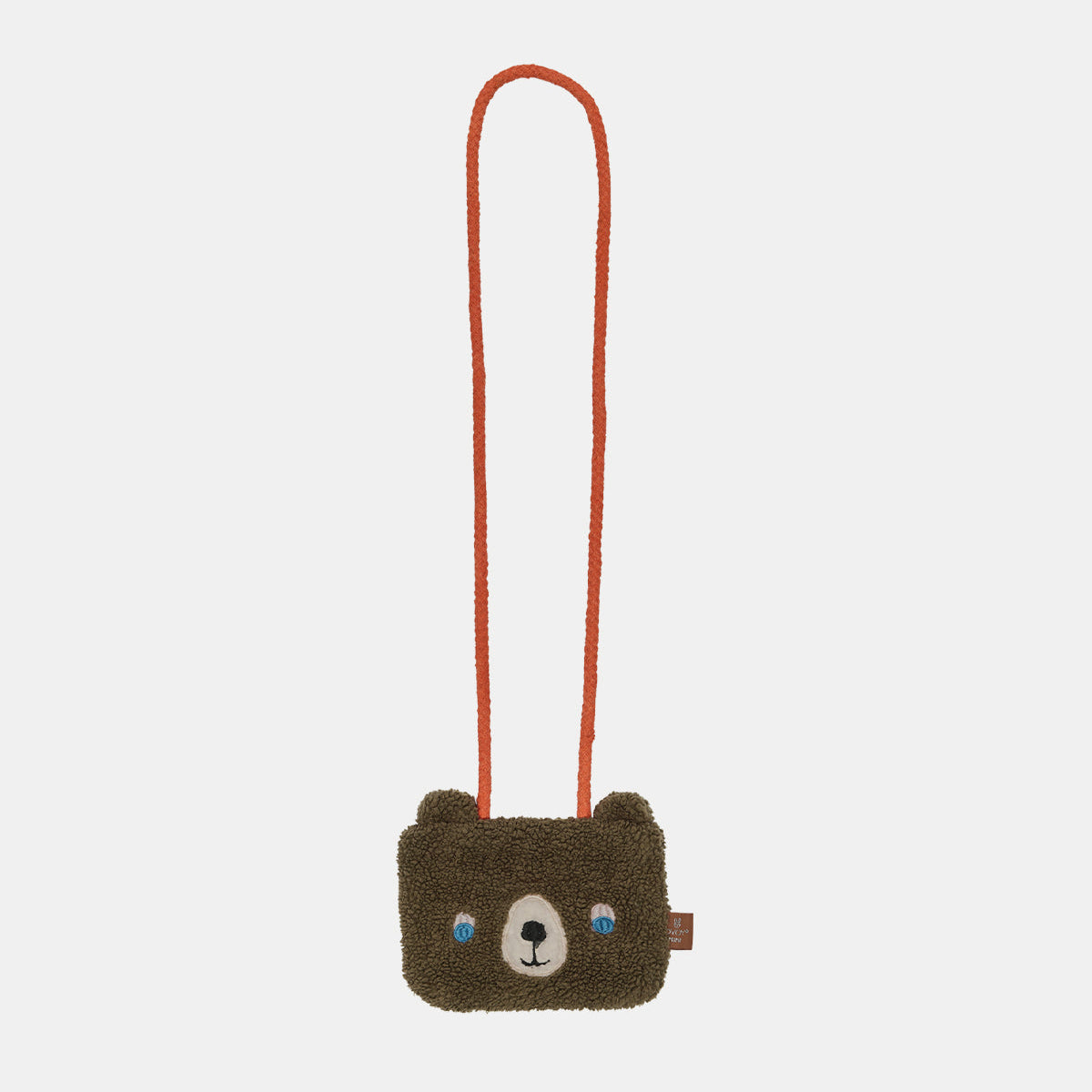 Small brown bag with bear face design on a white background