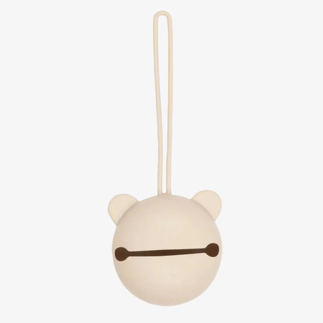 White bear-shaped keychain with a brown mouth on a white background
