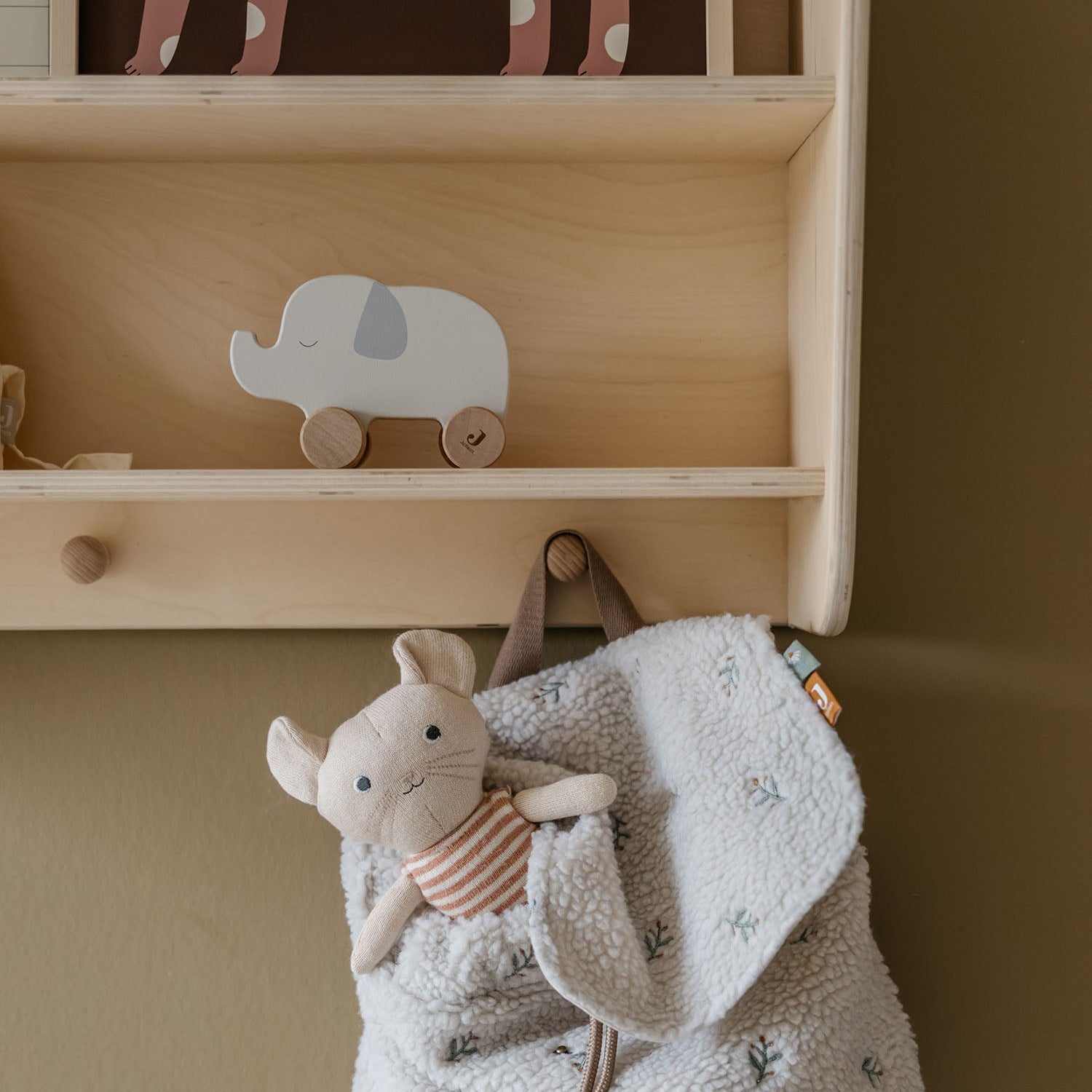 little otja mouse toy in backpack