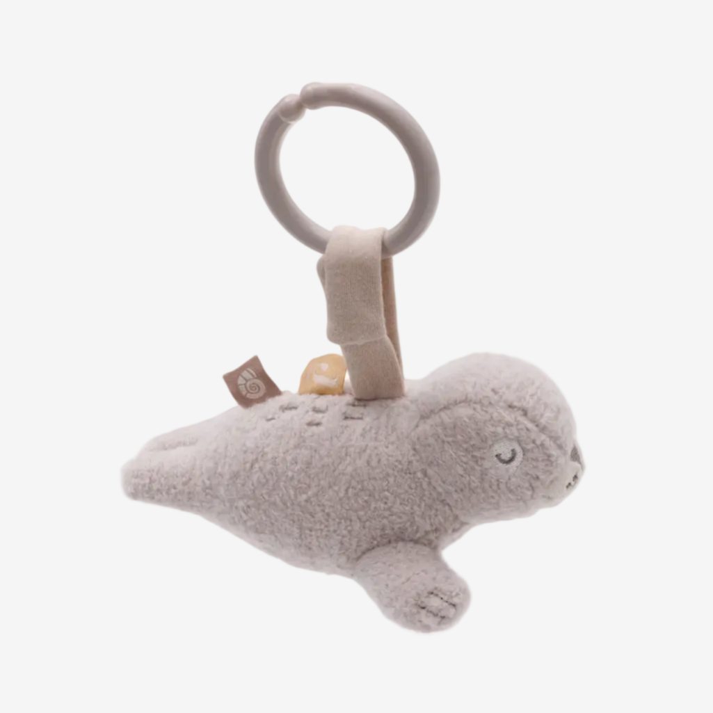 Plush toy with a rattle on a white background
