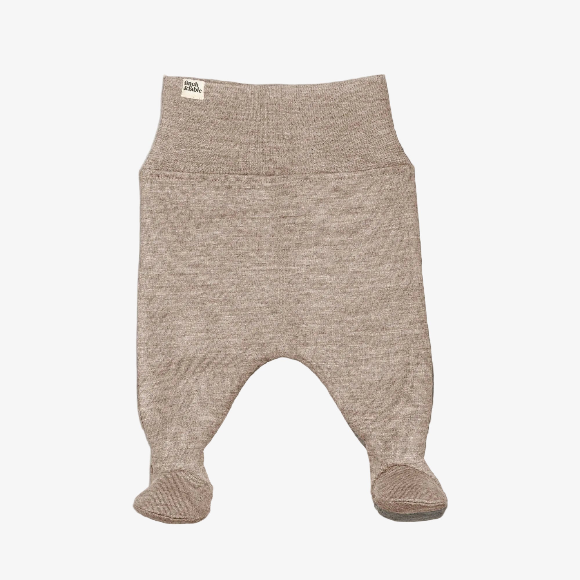 A pair of baby footed knit pants in a heathered taupe-beige color, featuring a wide ribbed waistband and a small brand tag on the left side, shown against a light gray background. 