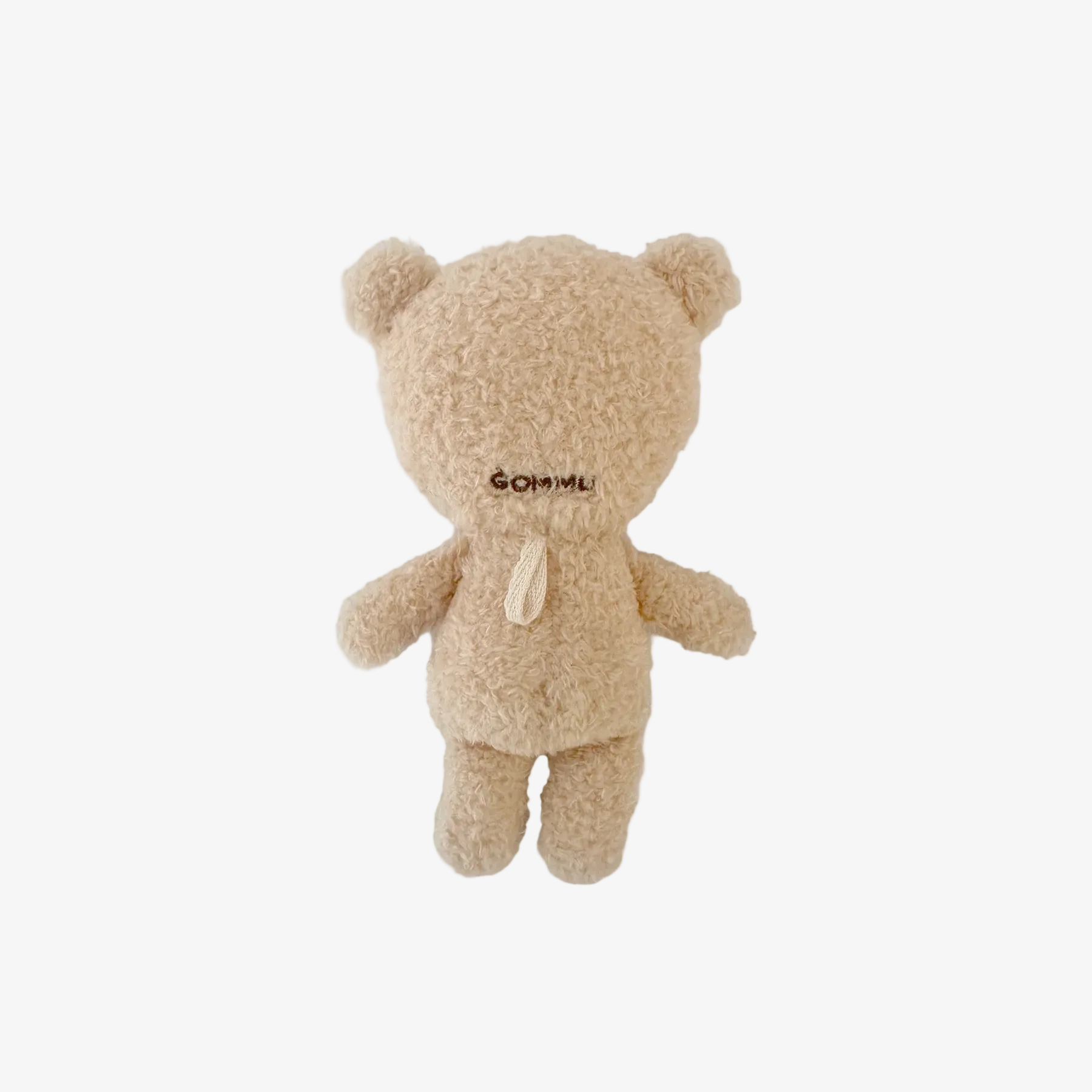 Beige teddy bear plush toy on a white background