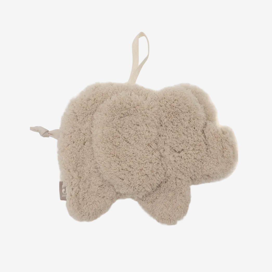 Plush elephant toy with a tag on a white background