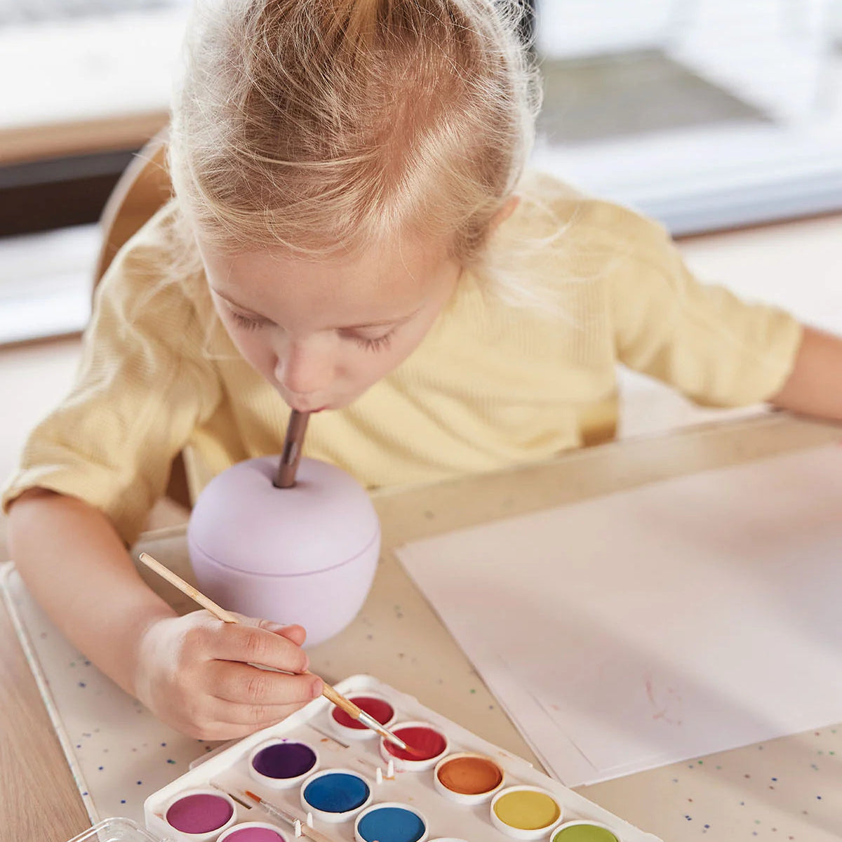 little otja silicone lvander apple cup, kid sipping from the cup