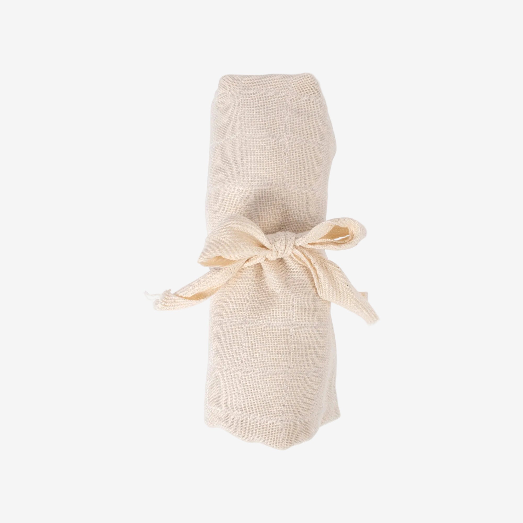 Beige fabric swaddle with a ribbon on a white background