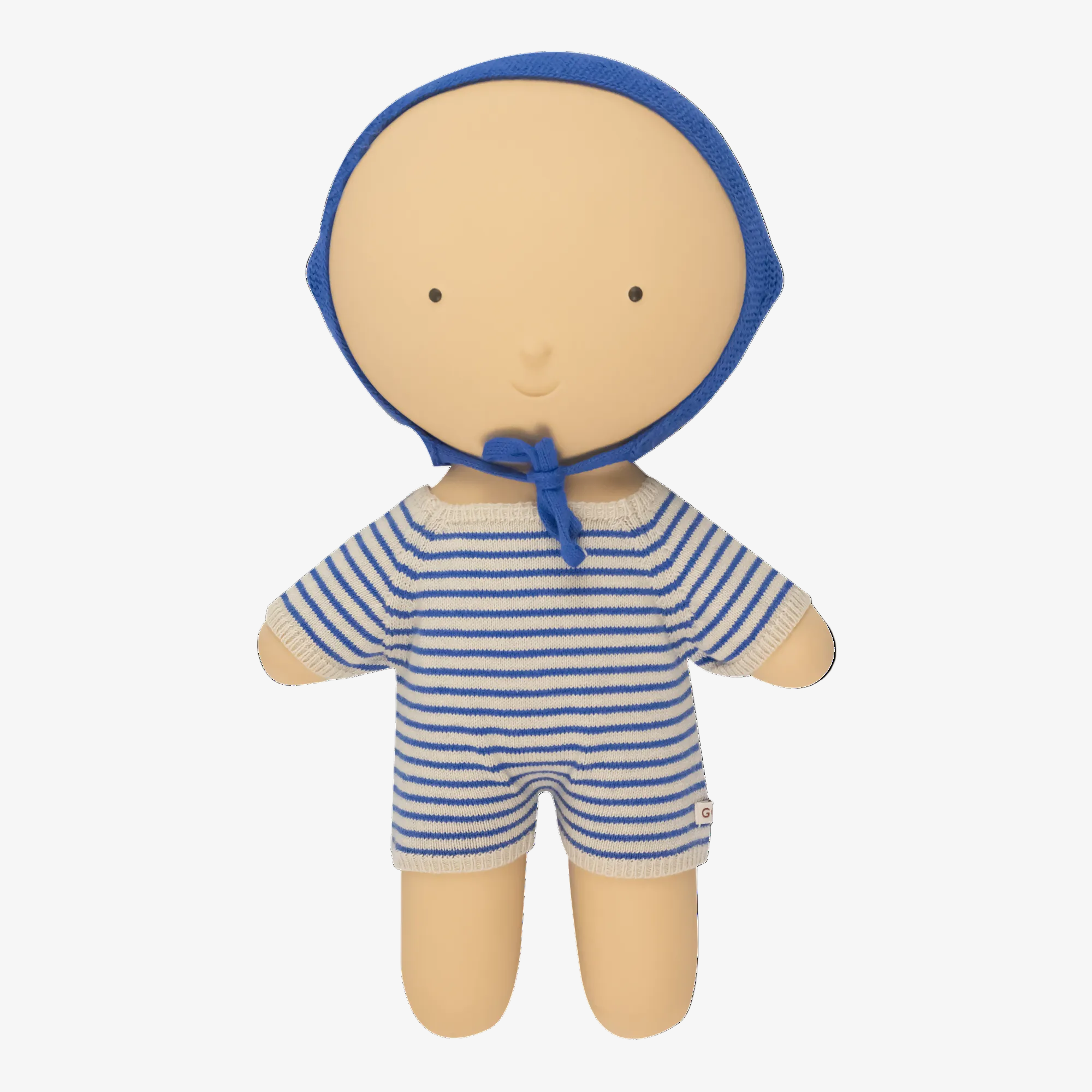 A soft fabric doll with a round beige face and limbs, wearing a blue bonnet and a blue-and-white striped short-sleeve romper, centered on a plain white background. 