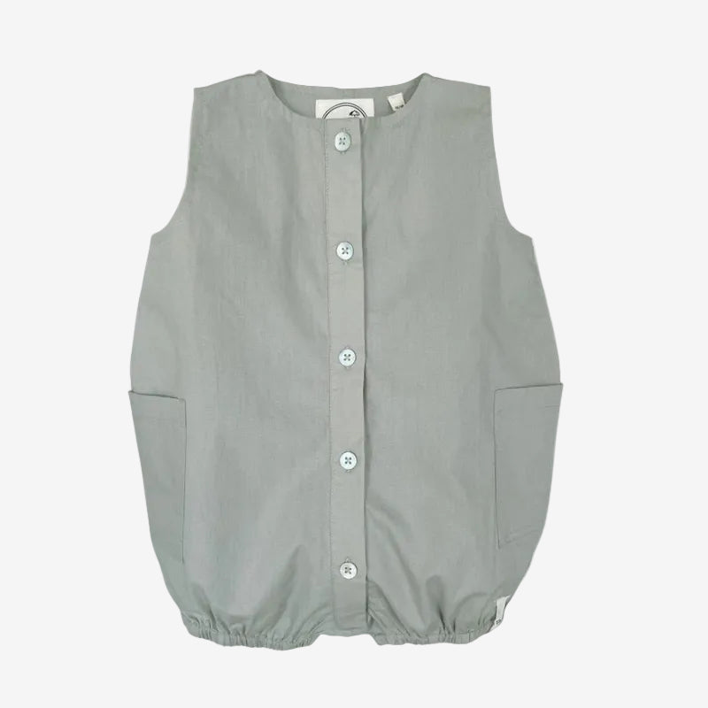 Light gray sleeveless button-up garment on a white background